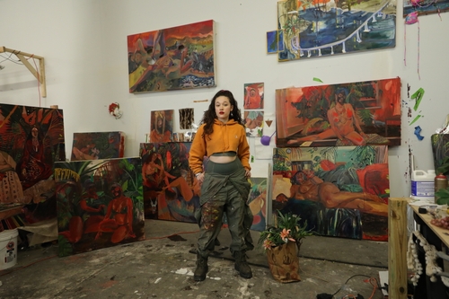 Artist Gisela shown in studio